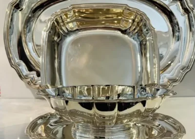 Jatte + plat ovale + saucière en argent massif.